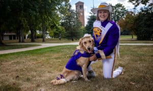 Winnie and Gabi as part of the University of Northern Iowa (UNI) marching band